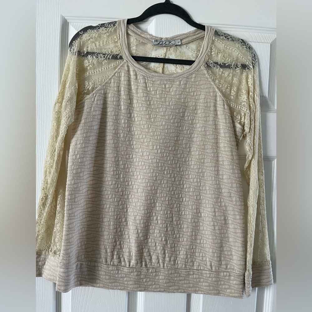 Woman’s long sleeve, blouse, size large